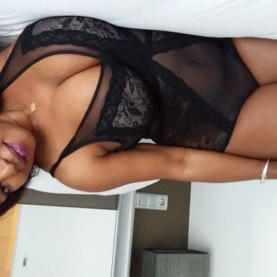 Ndey showing off semi-sheer bodystocking