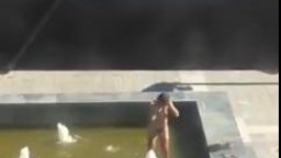 Russian woman bathing naked