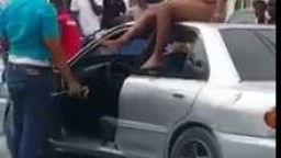 Naked latina woman on a car
