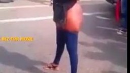 African woman showing fatr naked ass