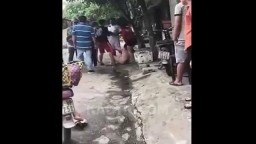 Vietnam woman stripped naked in the street
