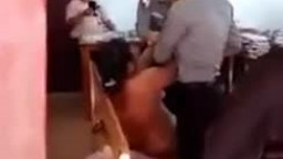 Myanmar police strip woman naked