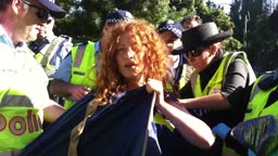 protestor stripped by police another angle
