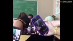 Girl showing naked ass in class talking with a teacher